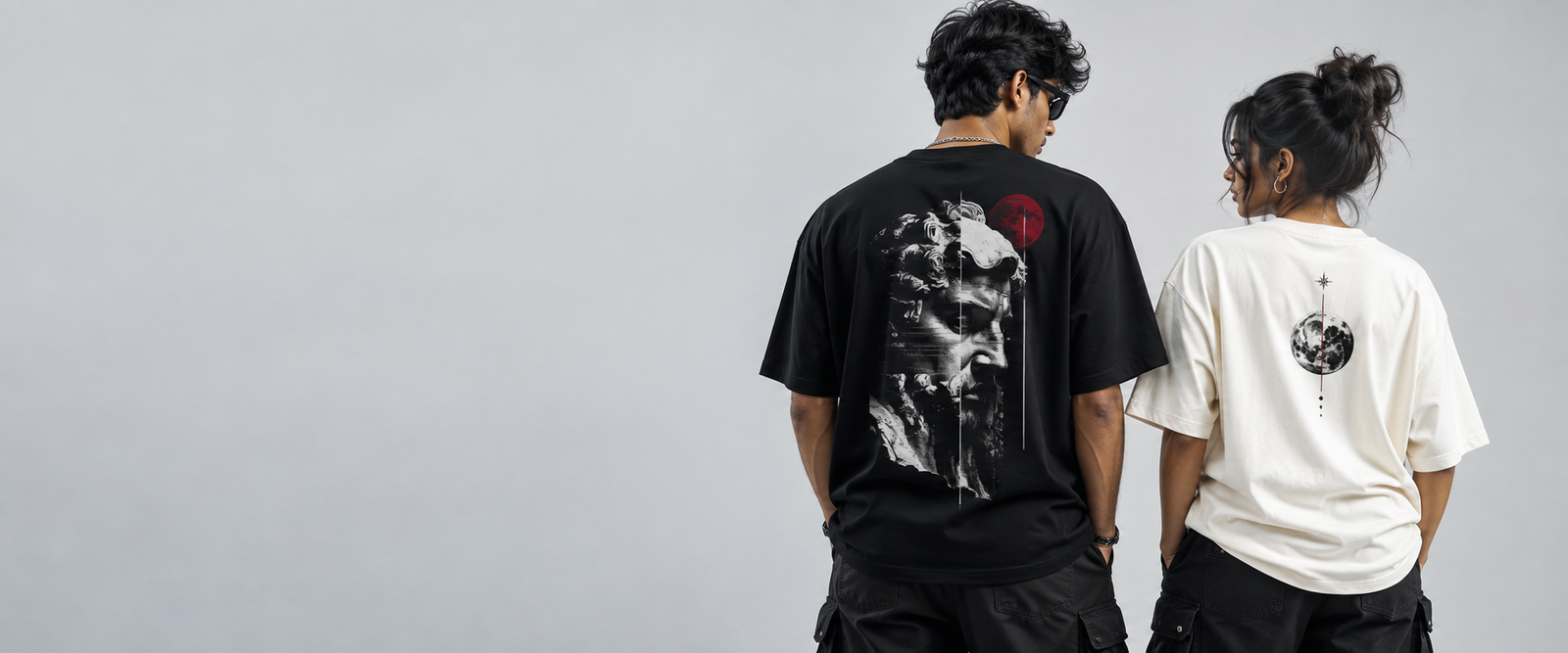 Two people wearing 6G Clothing graphic t-shirts